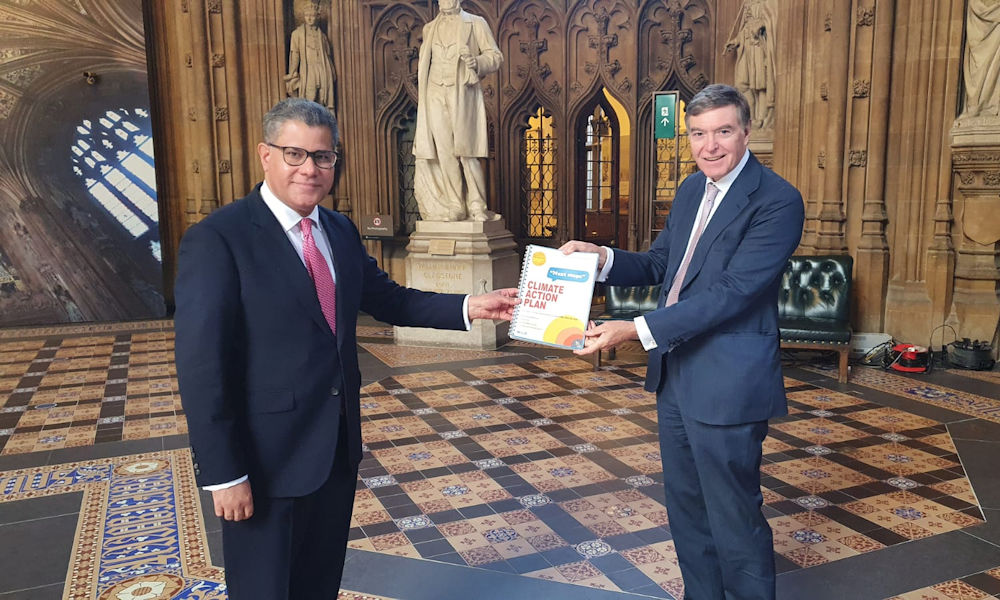 Philip Dunne MP presenting COP26 President, Rt Hon Alok Sharma MP, with South Shropshire Climate Action’s Report