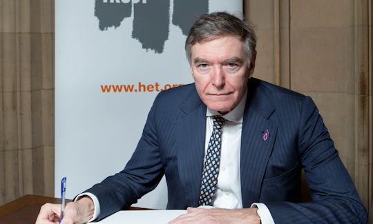 Philip Dunne MP signs the Holocaust Educational Trust’s Book of Commitment