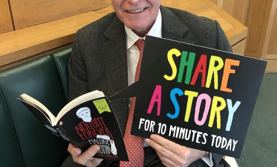 Philip Dunne celebrates joy of reading for World Book Day.